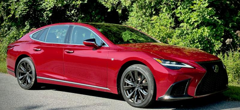 The flagship of the Lexus fleet, the LS500 is long, low, sleek and luxurious; it does a fine job of keeping the outside world . . . outside. F Sport trim includes these wrap-around radiator grilles, special badges and 20-inch Gloss Black Metallic wheels. This color is Matador Red Metallic.