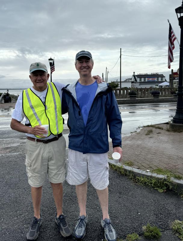 Niel Wienges and Peter Hartel supervise the parking. (Photo by Ed O’Brien)