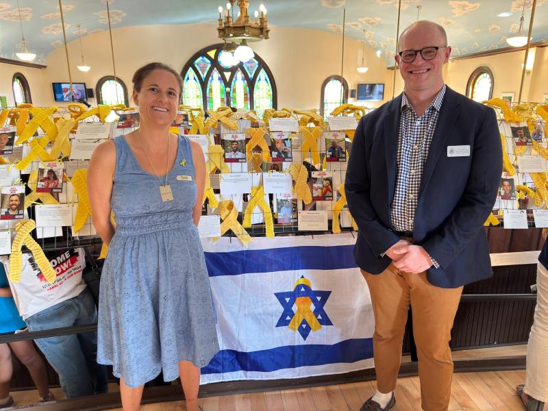 Exhibit organizer Anya Davidson with Scott Dresser, District Representative for U.S. Representative Jared Golden. (Photo courtesy Jordan Cohen)