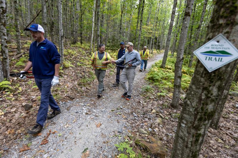 Maine Water convened about 20 volunteers to work on the Round The Mountain trail on Friday, September 20. (Photo courtesy Coastal Mountains Land Trust) Maine Water convened about 20 volunteers to work on the Round The Mountain trail on Friday, September 20. (Photo courtesy Coastal Mountains Land Trust)