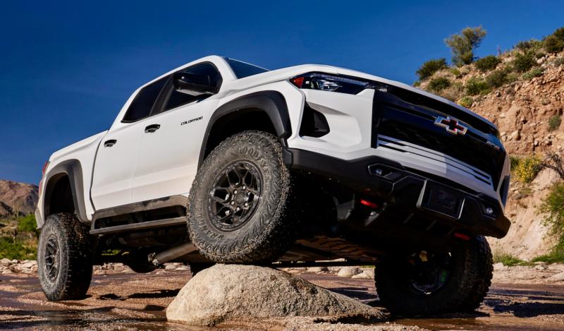 The Silverado ZR2 Crew in its natural habitat. Summit White (with a Jet Black and Graystone interior) makes the pair of bow-mounted red tow hooks pop.