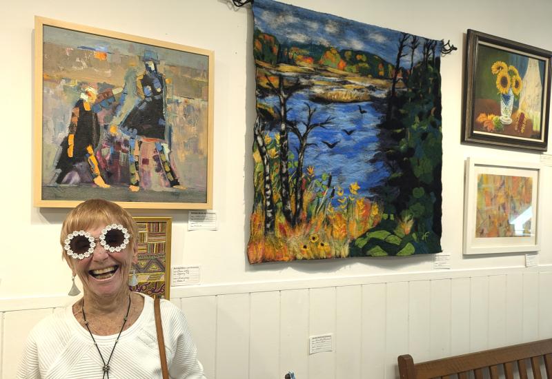 Carol McCarthy views works by Carol Wiley and Helen Farnham through daisy-tinted glasses. Courtesy of the venue