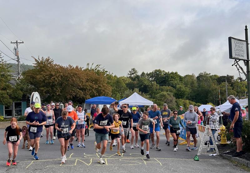 Runners and walkers put an energetic start to Windjammer Festival Day 2 at the Camden Public Landing with the annual Camden Fire Dept. Family Fun 5K. The course took them Bay View and Chestnut streets in Camden, and back to the harbor. (Photo by Lynda Clancy)