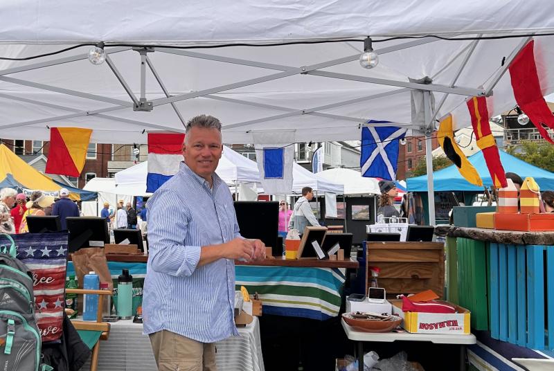 Earl Holt and his wife, Lisa, of Camden, are one of the vendors at Windjammer Weekend. (Photo by Lynda Clancy)