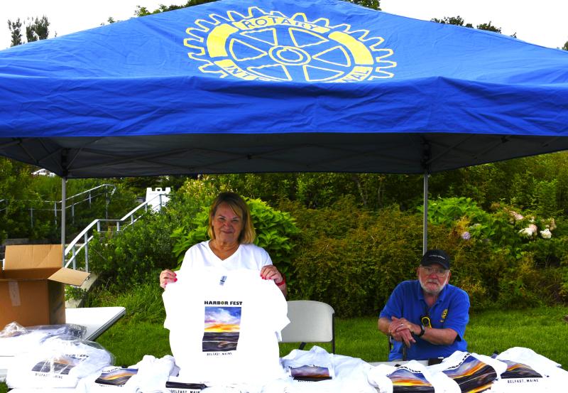 More than 50 volunteers, including these two Rotary Club members at the club’s information tent, made the 17th annual Belfast Harbor Fest along the Belfast waterfront, hosted by the club, a success on Aug. 17, 18 and 19. More than 50 volunteers, including these two Rotary Club members at the club’s information tent, made the 17 th annual Belfast Harbor Fest along the Belfast waterfront, hosted by the club, a success on Aug. 17, 18 and 19.