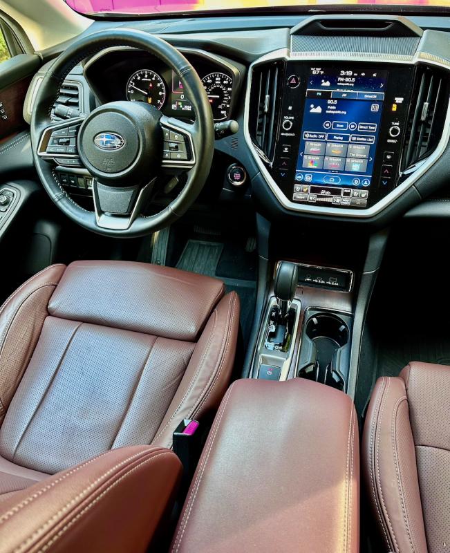 The Ascent Touring has the poshest and most comfortable Subaru interior yet, and this crisp, large Starlink infotainment monitor is easy to suss out. Rather than a button or dial on the console, touchpads on the screen select the drive modes. There’s also a scanning nanny that keeps an eye on where the driver is looking and provides a figurative elbow to the ribs if one’s attention wanders. The Ascent Touring has the poshest and most comfortable Subaru interior yet, and this crisp, large Starlink infotainment monitor is easy to suss out. Rather than a button or dial on the console, touchpads on the screen select the drive modes. There’s also a scanning nanny that keeps an eye on where the driver is looking and provides a figurative elbow to the ribs if one’s attention wanders.