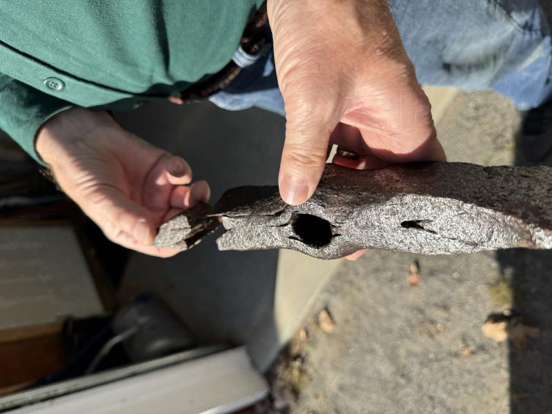 The beautifully crafted hammer/axe found in two pieces. (Phot by Ed O’Brien) Hammer