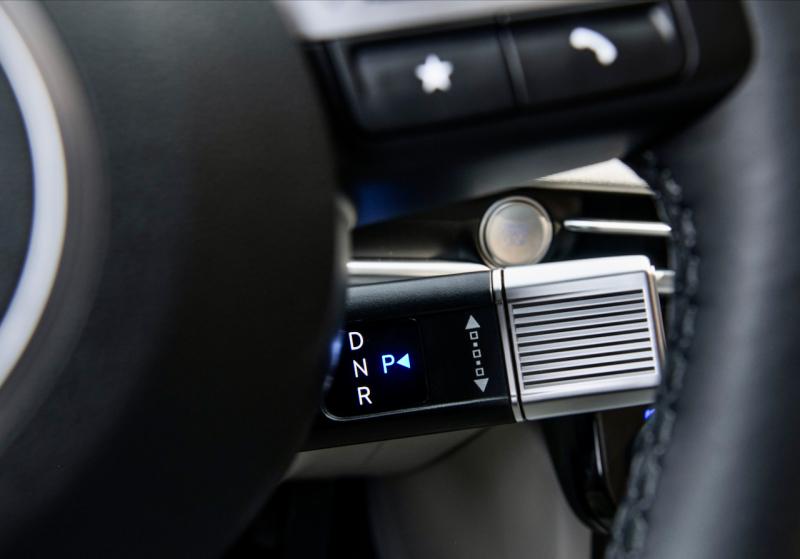 What looks like an oversize control stalk behind the wheel is the Tucson’s new gear selector. Twist the chrome bit toward the front of the car to engage Drive, twist it back the other way for Reverse, and push in on the end of it for Park. It’s surprisingly intuitive, and the e-brake automatically engages at the same time. Tucson car