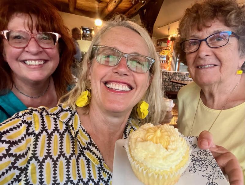 L-r: Christine Buckley, Patrisha McLean, and Mary Lou Smith enjoy a yellow taste treat at the 2024 “Into the Light!” Foodie Festival that raised $28,000 for Finding Our Voices. (Photo courtesy Finding Our Voices) L-r: Christine Buckley, Patrisha McLean, and Mary Lou Smith enjoy a yellow taste treat at the 2024 “Into the Light!” Foodie Festival that raised $28,000 for Finding Our Voices. (Photo courtesy Finding Our Voices)
