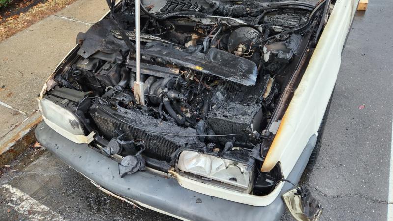 The engine compartment of the 1997 Volvo after its fire. (Photo courtesy Camden Fire Dept.) Volvo after fire