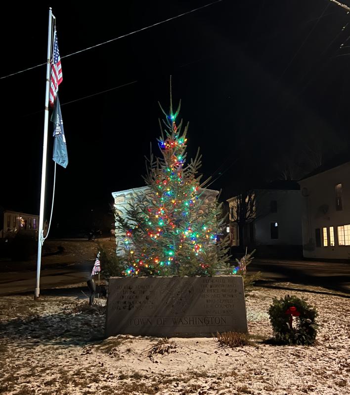 Christmas Tree at the Washington Monument on Dec. 22. (Sarah Masters photo) A short lit Christmas tree in front of a stone monument to War Veterans