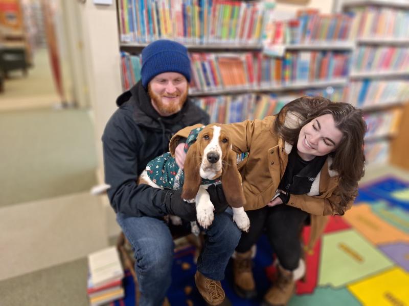 And Daisy, the basset hound puppy, decided it was much warmer inside the library. (Photo by Sarah Shepherd) Photo by Sarah Shepherd