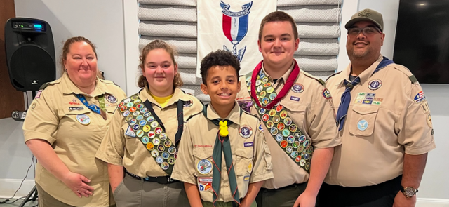 Jamie Santiago, Life Scout Arianna Allen, Tenderfoot Scout Christopher Santiago, Eagle Scout Eric Allen, and Christopher Santiago. The Allens are niece and nephew of Jamie and Christopher. (Photo courtesy Chuck Mahaleris) Jamie Santiago, Life Scout Arianna Allen, Tenderfoot Scout Christopher Santiago, Eagle Scout Eric Allen, and Christopher Santiago. The Allens are niece and nephew of Jamie and Christopher. (Photo courtesy Chuck Mahaleris)