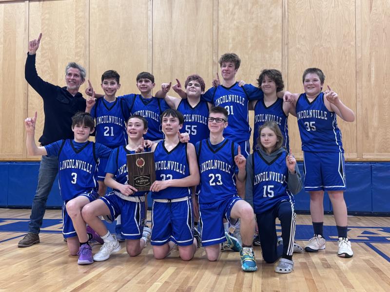 Couch Doug Mott and the Championship Boys Middle School Team. (Photo by Tracee O’Brien) Basketball