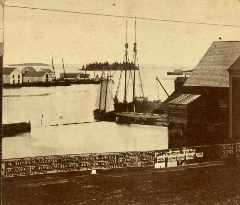 A view over Camden Harbor from Main Street prior to the construction of 39 Main Street. (H.A. Mills stereoscopic photo, courtesy Ben Ellison/Camden-Rockport Historical Society) Historic Main Street view, Camden.