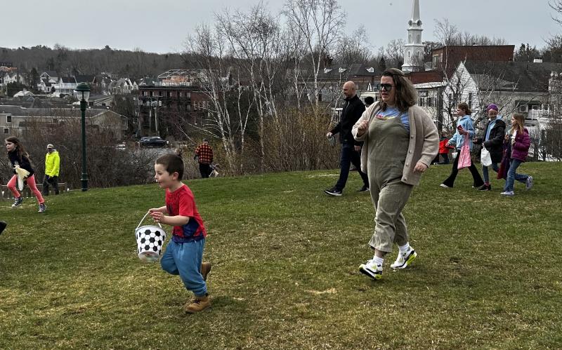 They were off and running, more than 200 children, chasing down the eggs April 19 at a community Easter Egg Hunt in Camden. (Photo by Lynda Clancy) c