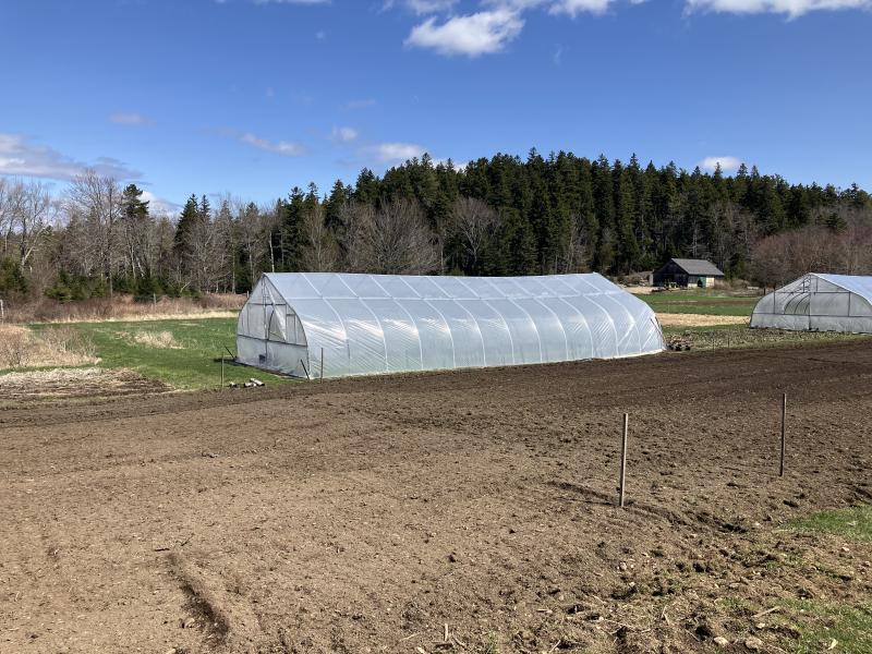 Green Houses Dot the Fields at Four Season Farm You can hear more on winter farming claracoleman.com/winter-growers-podcast
