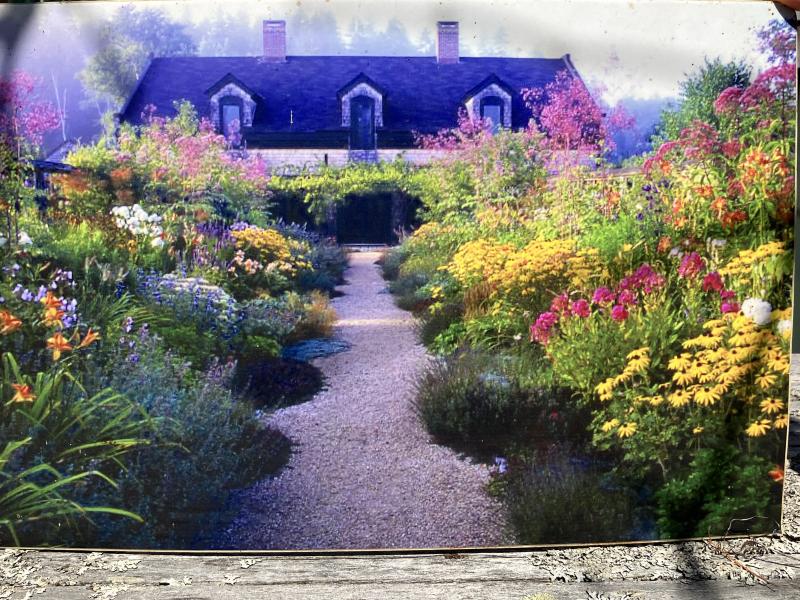 Four Seasons Farm in Full Bloom The house was built in 2006, in order to house 11,000 books on agriculture. The painting captures the front garden in full bloom.