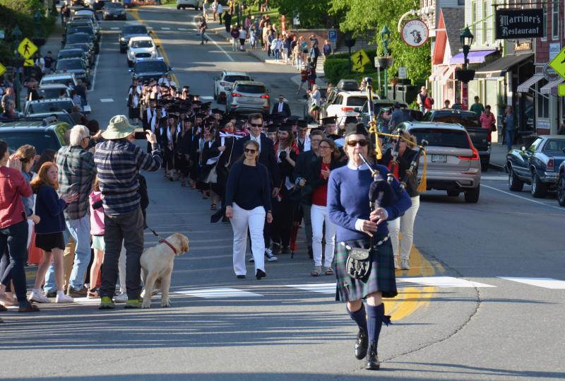Here they come! The Camden Hills Regional High School Class of 2025 descends Main Street in downtown Camden for its baccalaureate march through town, and up to the First Congregational Church for a nondenominational service June 2. (Photo by Lynda Clancy) c
