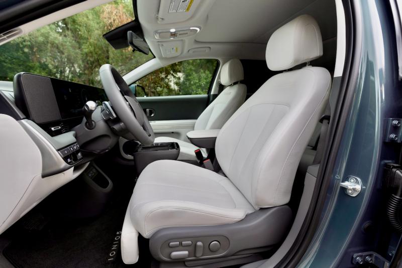 A loaded Ioniq 5 very nearly qualifies as a luxury car. Note the extendable footrest; the passenger front seat has one too. Both front seats also recline—perhaps for a quick nap while the car is plugged in at a charging station on the highway. A loaded Ioniq 5 very nearly qualifies as a luxury car. Note the extendable footrest; the passenger front seat has one too. Both front seats also recline—perhaps for a quick nap while the car is plugged in at a charging station on the highway.