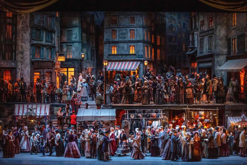 A scene from Act II of Puccini's "La Bohème." (Photo by Evan Zimmerman / Met Opera)