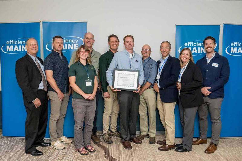 Evergreen recognized as Maine’s #1 contractor for insulation rebates by Efficiency Maine in 2025 Evergreen Home Performance team with Efficiency Maine staff at 2025 awards ceremony for top insulation rebate contractor in Maine