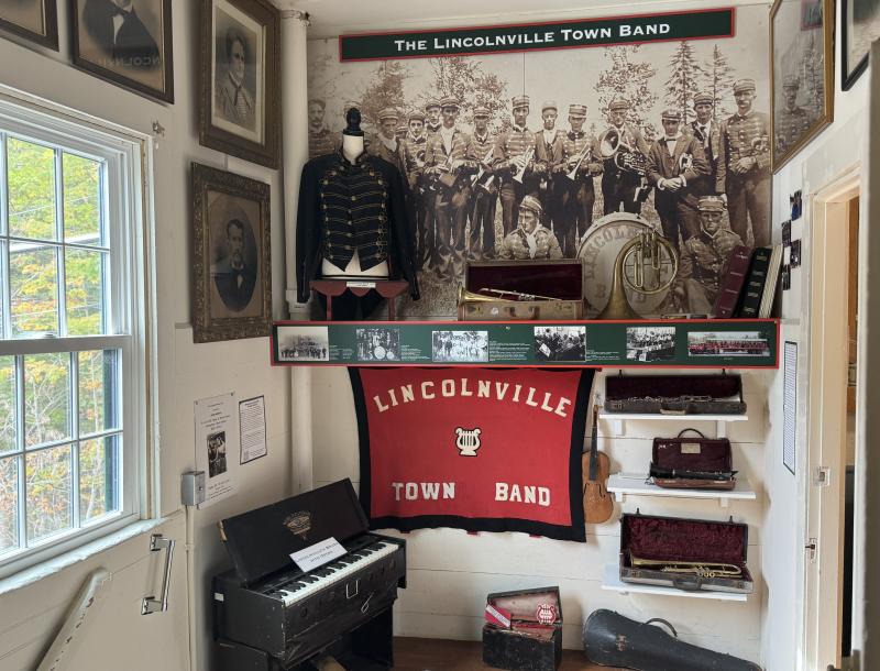 An exhibit for the Lincolnville Town Band at the top of the stairs. (Photo by Ed O’Brien) LHS