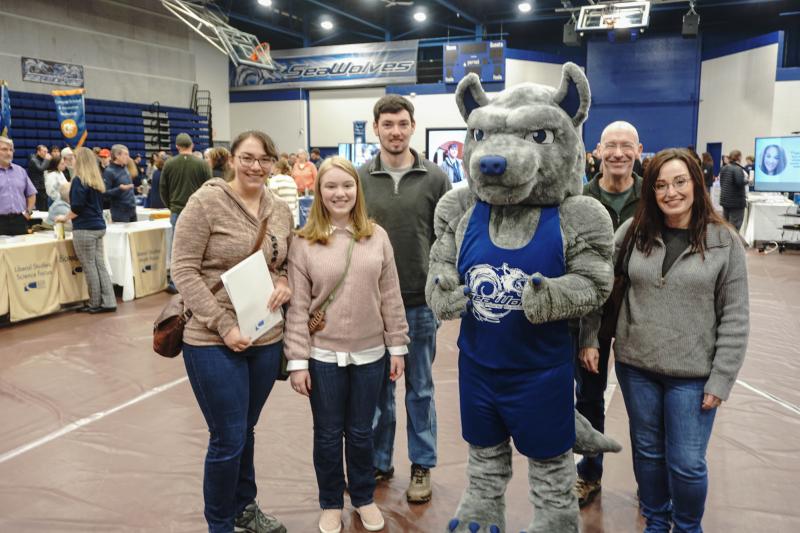 (Photo courtesy Southern Maine Community College) Family poses with school mascot