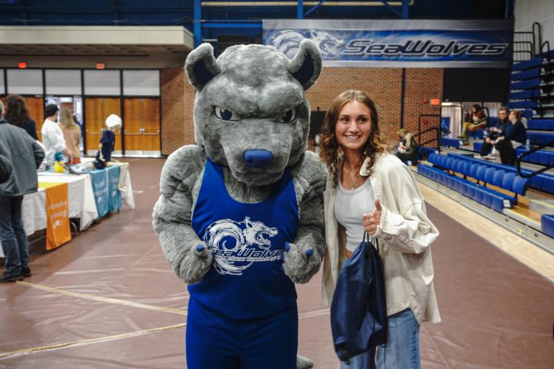 (Photo courtesy Southern Maine Community College) Female poses with school mascot