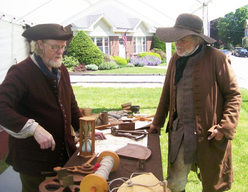 two men in colonial apparel