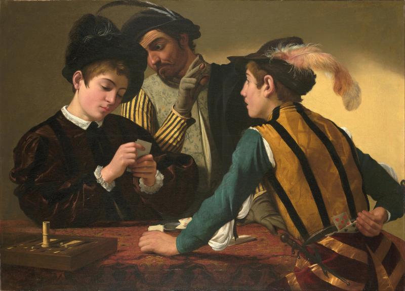 three males at a card game
