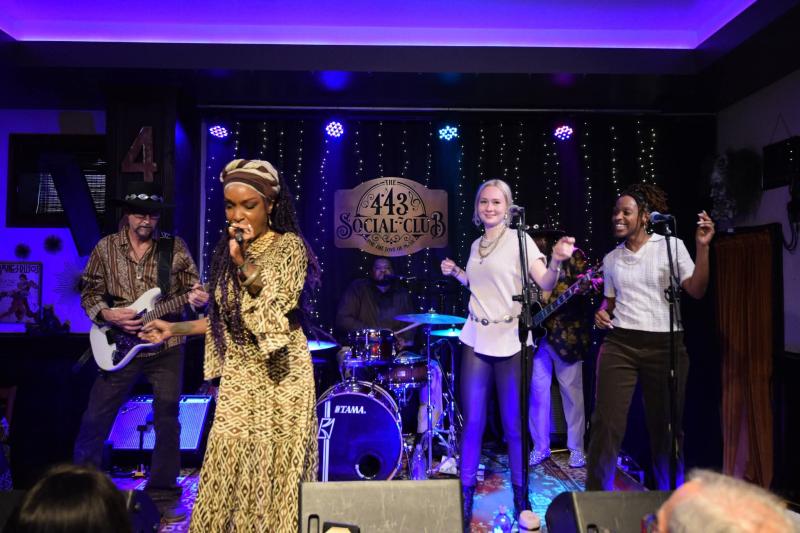 A picture of Kat Riggins and her band.