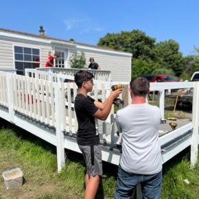 High School students address accessibility issues for an elderly homeowner. (Photo courtesy Midcoast Habitat for Humanity)