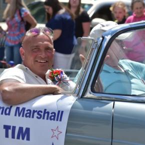 Tim Hoppe, former Thomaston Police Chief, rides the parade route as this year's Grand Marshal of the Thomaston Fourth of July Parade. (Photo by Sarah Thompson)