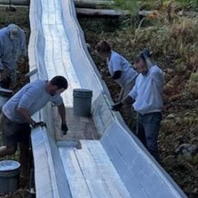 Abe Rhode, Kristi Van Blarcom, Ian Bogey, David Garner paint the toboggan chute with a fresh coat of white paint Oct. 5. (Photo courtesy Peter Berke) Abe Rhode, Kristi Van Blarcom, Ian Bogey, David Garner paint the toboggan chute with a fresh coat of white paint Oct. 5. (Photo courtesy Peter Berke)