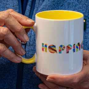 mug with "happiness" written on the side.