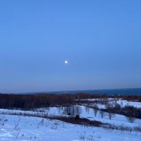 Snowy view and full moon