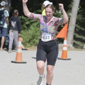 female athlete raises cheers