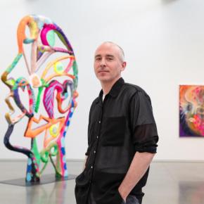 man in art gallery