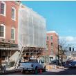 BELFAST - Scaffolding covers the front of a Main Street building owned by Maine Farmland Trust. (Photo by Ethan Andrews)