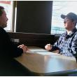 BELFAST - John Jewell of Bangor, left, interviews Trevor Burleigh of Old Town at McDonald's for an unrelated commercial trucking job. (Photo by Ethan Andrews)