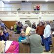 The audience in Searsport's Union Hall during a break in deliberations Wednesday night. (Photo by Ethan Andrews)