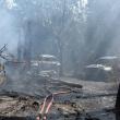 Dissipating hose mist reveals vehicles singed by flames from a barn fire at 207 Ludwig Road, in Hope, Wednesday, Sept. 11, 2024. (Photo by Sarah Thompson)