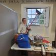 Noreen Mullaney, along with other volunteers, cleans the lower level of the Knox Museum during 2023's Together for Thomaston Event. (Photo by Kendray Rodriguez)