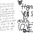 Thank you note to Finding Our Voices. Patrisha McLean, CEO and Founder of Finding Our Voices, flanked by the nonprofit’s Chief of Staff Mary Kamradt  (right) and Patrisha’s daughter and Finding Our Voices volunteer Jackie McLean Strack. Jackie is featured in the group’s poster campaign referencing abuse by her father. She also provides the music for Patrisha’s Podcast “Let’s Talk About It”.  (Photo courtesy Finding Our Voices)