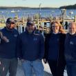 Premier Pools and Spas co-owner Derek Messenger, Co-owner Mike Dubuc, Pool Design Consultant Shelly Quinn, and Pool Design Consultant Kenn Quinn. 