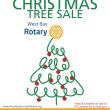 Image shows a cartoon christmas tree topped with the Rotary logo. Text reads: West Bay Rotary's Annual Christmas Tree Sale. Friday, November 29 through mid-December. Trees and wreaths on sale at 115 Commercial Street, Rockport, ME. Sale open Thursdays and Fridays from noon to 6pm, and Saturdays and Sundays from 9am to 6pm. 