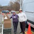 Volunteers help lighten the load. Photo courtesy Alan Kearl