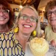L-r: Christine Buckley, Patrisha McLean, and Mary Lou Smith enjoy a yellow taste treat at the 2024 “Into the Light!” Foodie Festival that raised $28,000 for Finding Our Voices. (Photo courtesy Finding Our Voices)