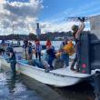 Clean-up volunteers unload trash collected from along the shoreline of the Damariscotta River on November 1, 2024. (Photo courtesy 